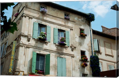 Framed View of an old building with flower pots on each window, Rue Des Arenes, Arles, Provence-Alpes-Cote d&#39;Azur, France Print