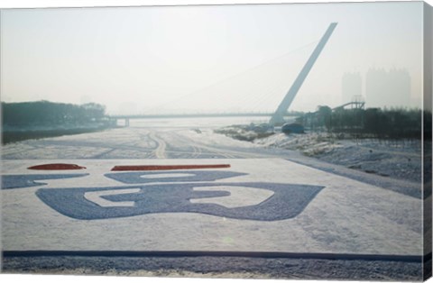 Framed Songhuajiang Highway Bridge across the frozen Songhua River, Harbin, China Print