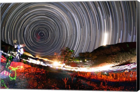 Framed Astronomers observe polar star trails above a mountain in Iran Print