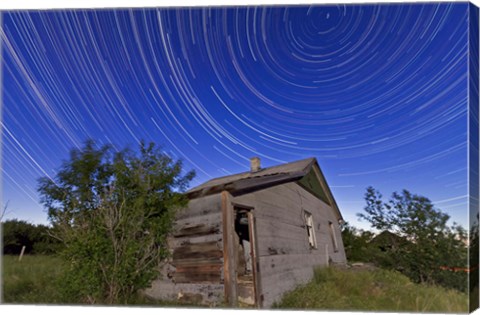 Framed Circumpolar star trails above an old farmhouse in Alberta, Canada Print