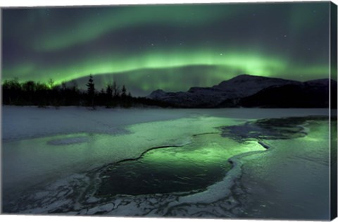 Framed Reflected aurora over a frozen Laksa Lake, Nordland, Norway Print