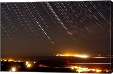 Framed Star trails above a village in the central desert of Iran Print