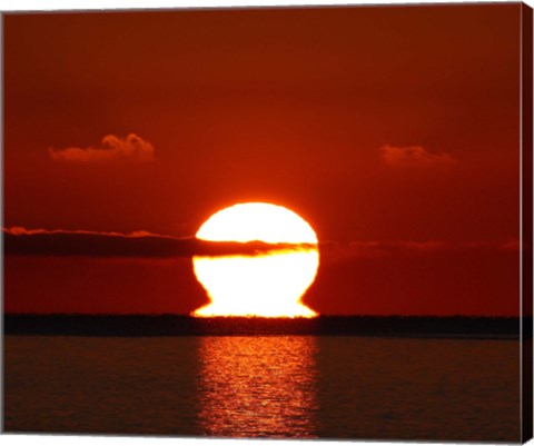 Framed omega-shaped sunrise above the water in Buenos Aires, Argentina Print