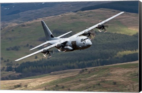 Framed C-130 Hercules of the Royal Air Force flying over North Wales Print
