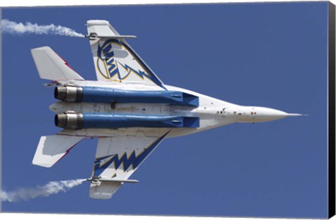 Framed Bottom view of a Russian MiG-29OVT aerobatic aircraft Print