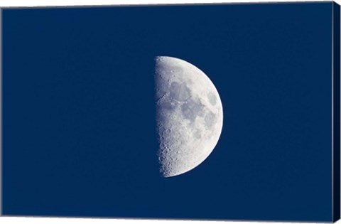 Framed First quarter moon taken near sunset with sky still bright in twilight Print