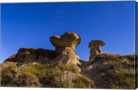 Framed Starry sky above hoodoo formations at Dinosaur Provincial Park, Canada Print