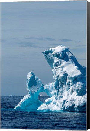 Framed arched iceberg floating in Gerlache Strait, Antarctica. Print