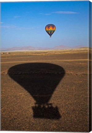 Framed Hot air balloon casting a shadow over Namib Desert, Sesriem, Namibia Print