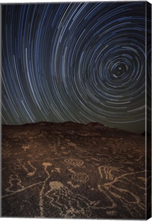 Framed Star trails at an ancient petroglyph site near Bishop, California Print