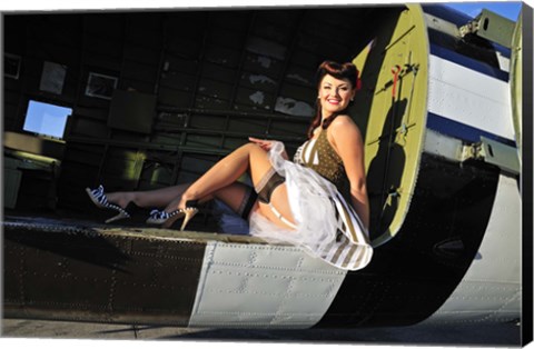 Framed Sexy 1940&#39;s style pin-up girl sitting inside of a C-47 Skytrain aircraft Print