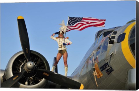 Framed 1940&#39;s style majorette pin-up girl on a B-17 bomber with an American flag Print