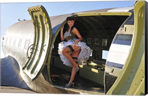 Framed Sexy 1940&#39;s style pin-up girl standing inside of a C-47 Skytrain aircraft Print