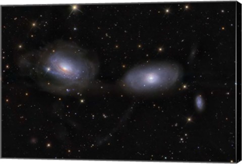 Framed Gravitionaly distorted Galaxies NGC 3169 and NGC 3166 Print