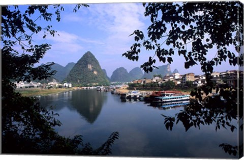 Framed Wonderful ragged Limestone Mountains and Li River and city life of Yangshuo area of China Print