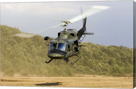 Framed Italian Air Force AB-212 ICO helicopter departs the landing zone, Italy Print