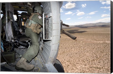 Framed HH-60G Pave Hawk gunner fires his GAU-17 machine gun Print