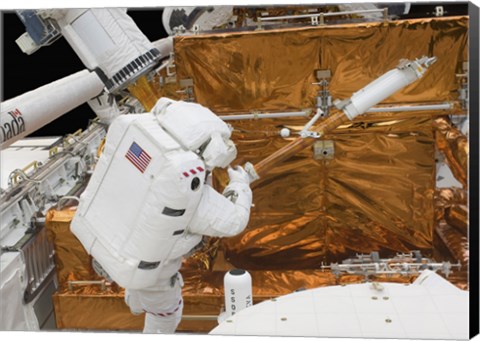 Framed Astronaut works with the Hubble Space Telescope in the cargo bay of Atlantis Print