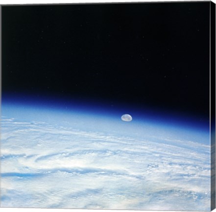 Framed Outer space shot of storm system in early stage of formation with moon in background Print