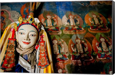 Framed Religious statue infront of Buddha mural at Shey Palace, Ladakh, India Print