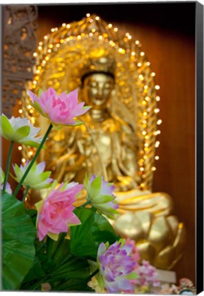 Framed Pink lotus flowers in front of gold statue, Kek Lok Si Temple, Island of Penang, Malaysia Print