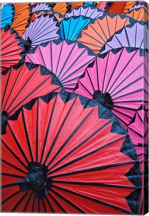 Framed Pattern of newly assembled decorative umbrellas drying in sun, Umbrella Making Center, Bo Sang, near Chiang Mai, Thailand. Print