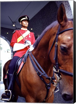 Framed Malaysia, Kuala Lumpur: a mounted guard stands in front of the Royal Palace Print