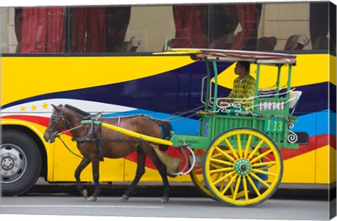 Framed Horse cart walk by colorfully painted bus, Manila, Philippines Print