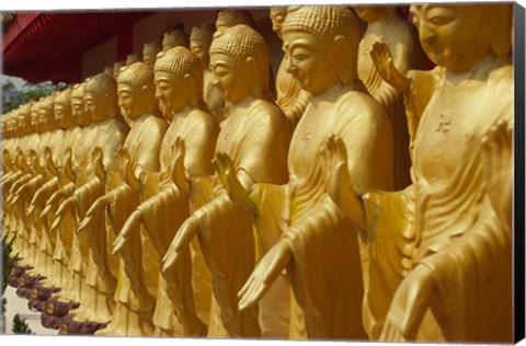 Framed Taiwan, Foukuangshan Temple, Standing gold-colored Buddha statues at a Buddhist shrine Print