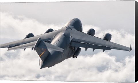 Framed C-17 Globemaster Above the Clouds Print