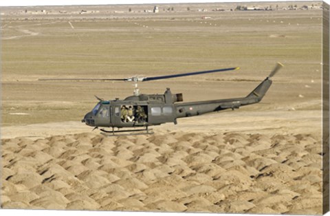 Framed Italian Army AB-205MEP Utility Helicopter Over Shindand, Afghanistan Print