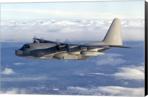 Framed MC-130P Combat Shadow Soars Above the Clouds Print