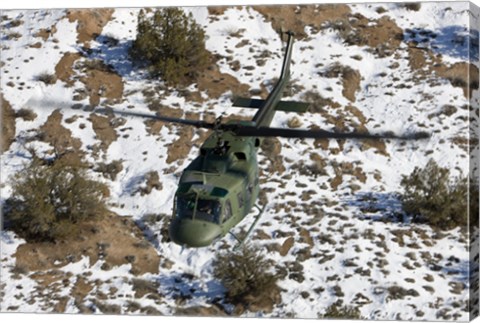 Framed UH-1N Twin Huey over Kirtland Air Force Base, New Mexico Print