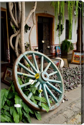 Framed Wagon Wheel, La Posada De Don Rodrigo Hotel, Antigua, Guatemala Print