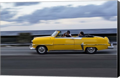 Framed 1950&#39;s era car in motion along the Malecon or seawall, Havana, Cuba Print