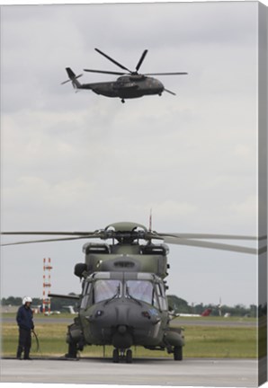 Framed German Army NH90 and its Predecessor, the CH-53 Sea Stallion Print