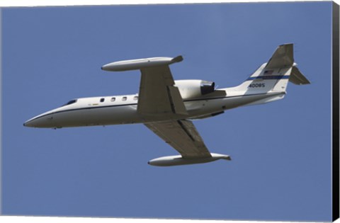 Framed United States Air Forces Europe C-21A Learjet in Flight over Germany Print