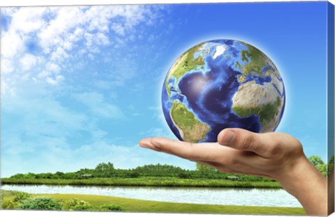 Framed Human Hand Holding Earth Globe with a Green Landscape Background Print