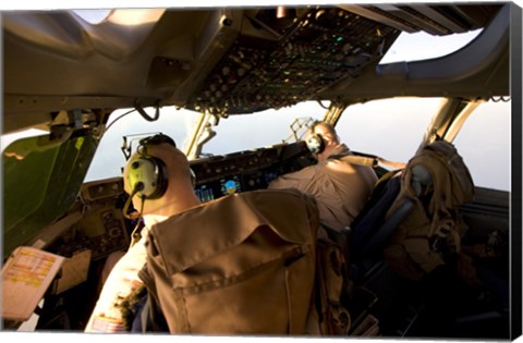 Framed US Army Pilots in-Flight in the Cockpit of a C-17 Globemaster III during a Mission to Qatar Print