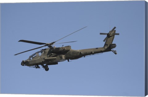 Framed AH-64 Apache in flight over the Baghdad Hotel in central Baghdad, Iraq Print