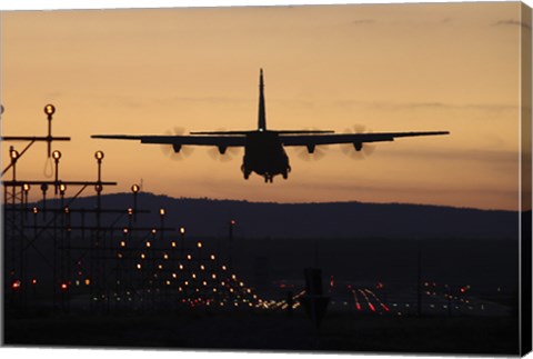 Framed C-130J Super Hercules Landing at Ramstein Air Base, Germany, at Dusk Print