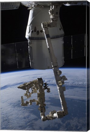 Framed SpaceX Dragon Commercial Cargo Craft Berthed to the ISS Print