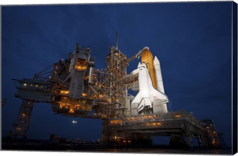 Framed Night view of Space Shuttle Atlantis on the Launch pad at Kennedy Space Center, Florida Print