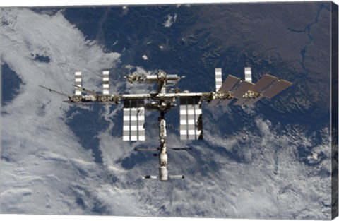 Framed International Space Station Backgropped by a Blue and White Earth Print