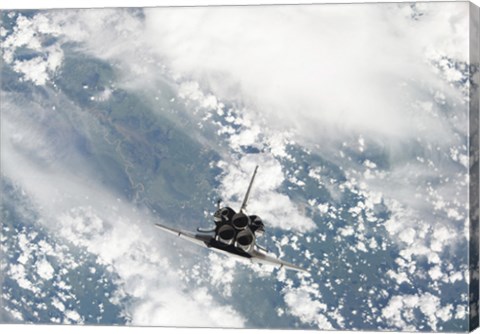 Framed Rear view of the Three main Engines of Space Shuttle Discovery as the Shuttle approaches the International Space Station Print