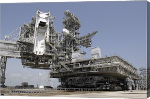 Framed mobile Launcher Platform is being moved via the Crawler-Transporter Underneath Print