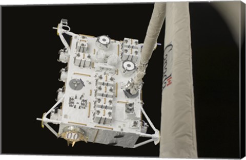 Framed Japanese Experiment Module Exposed Facility in the Grasp of the Shuttle&#39;s Remote Manipulator System Arm Print