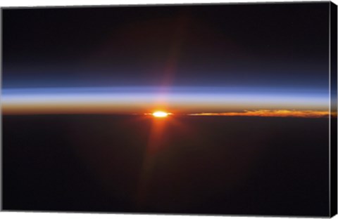 Framed Layers of Earth&#39;s atmosphere, brightly colored as the sun sets over South America Print