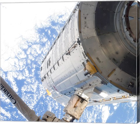 Framed Kibo Japanese Pressurized Module in the Grasp of the Robotic Canadarm2 Print