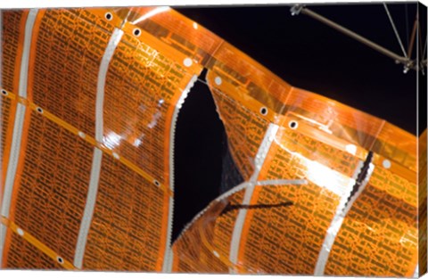 Framed Close-up of a Tear in Solar Array Material on the International Space Station Print